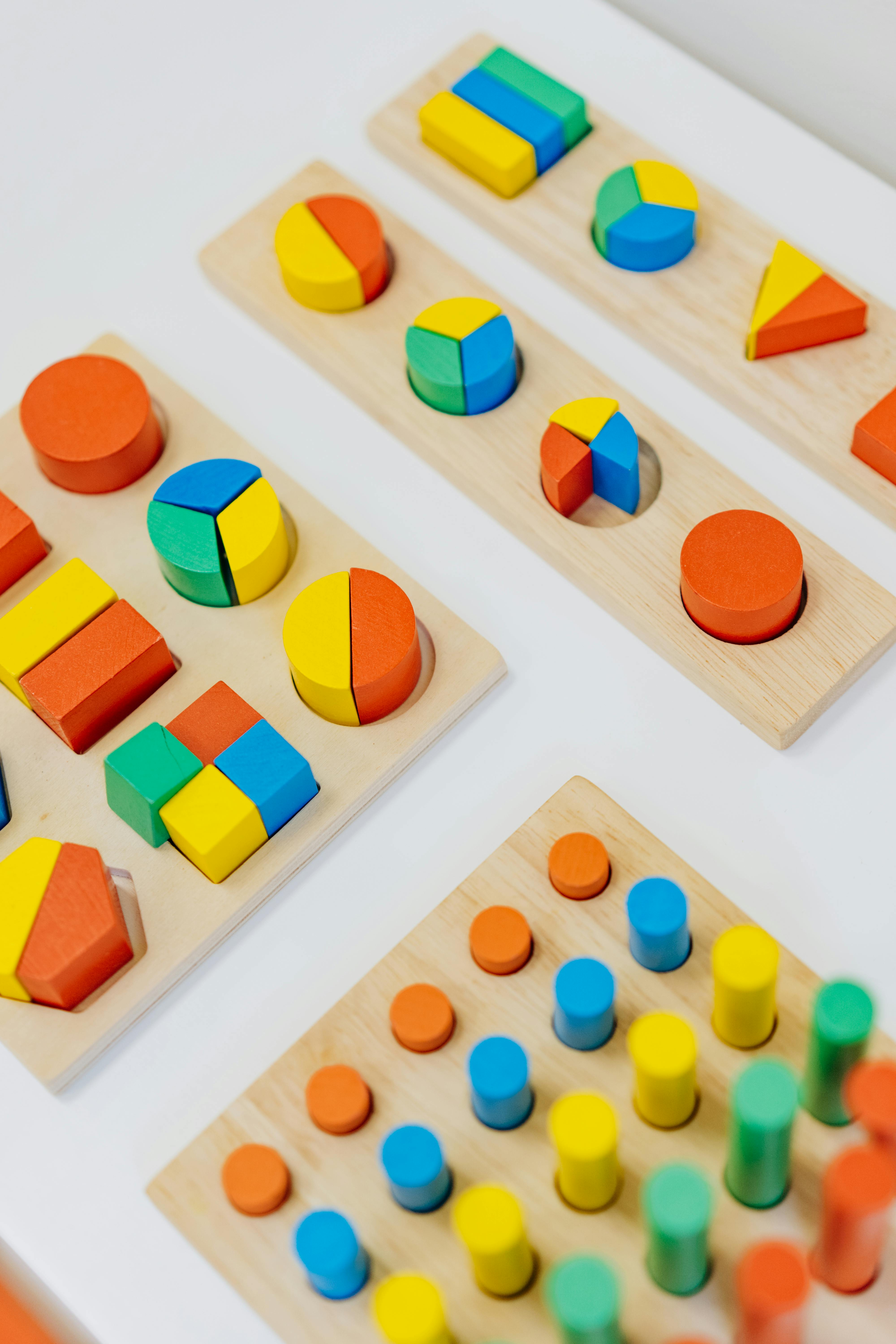 3 montessori toys with various colors